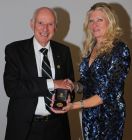 Colin Squires receiving the Pearson Memorial Medal from Carol Paris.
